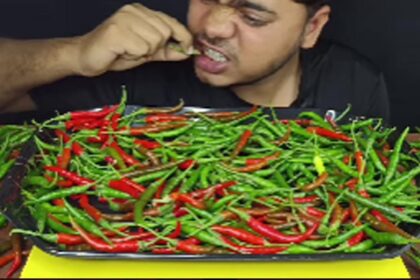 Watch: Delhi Food Vlogger Takes Spice Challenge To Another Level, Eats Plate Full Of Raw Chillies